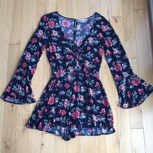 American Eagle navy and floral romper